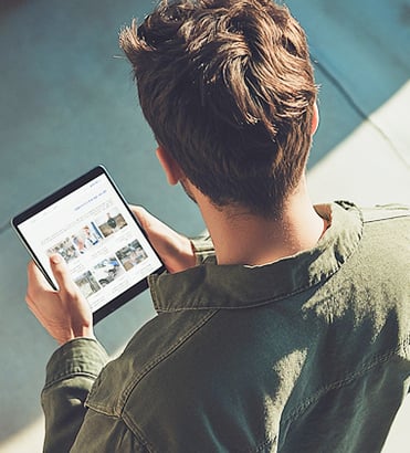 man met tablet in hand